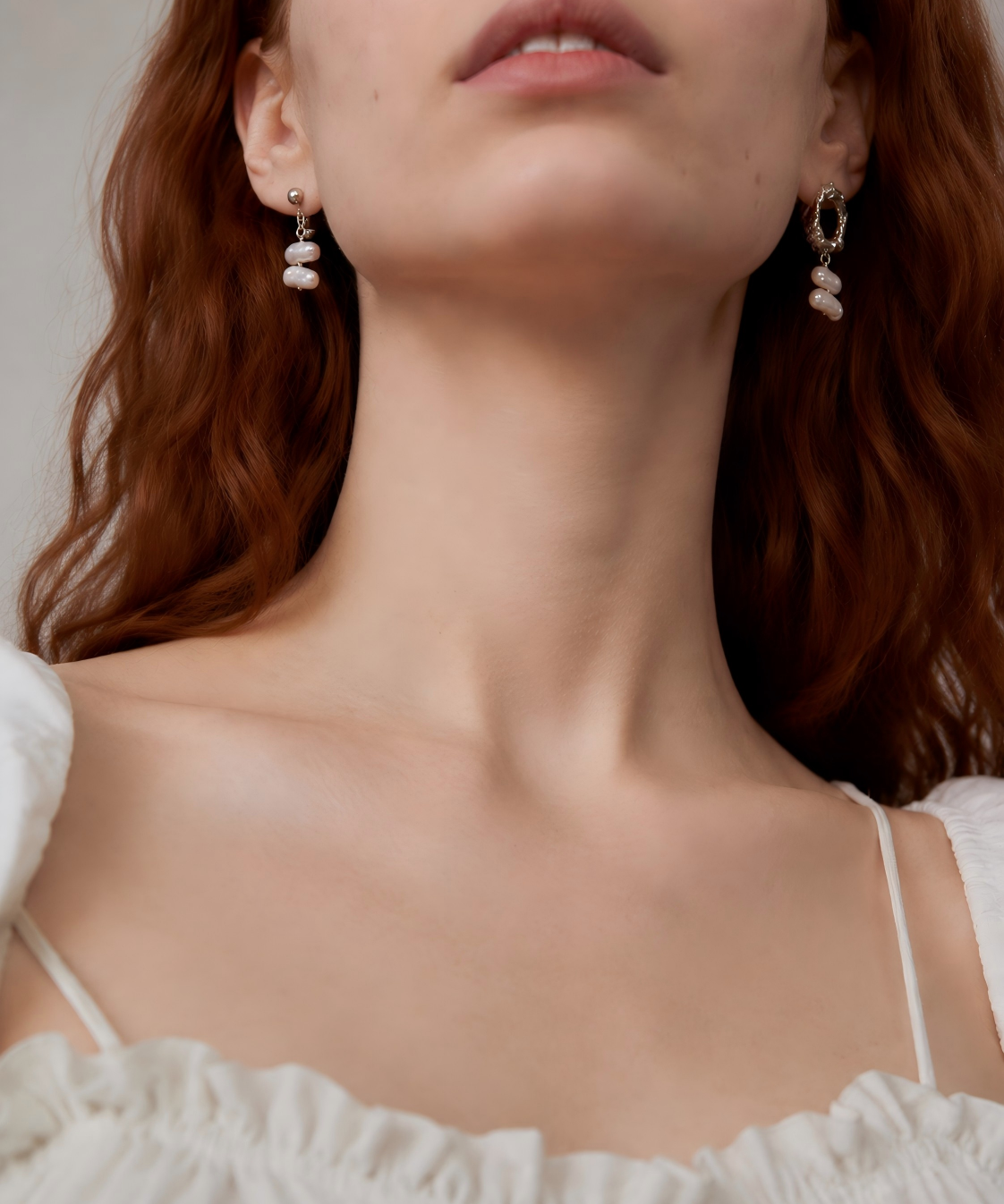 Gold and Silver Plated Baroque Pearl Drop Earrings detail view